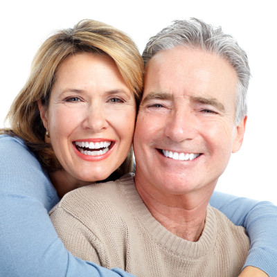 Senior smiling couple in love. Over white background.